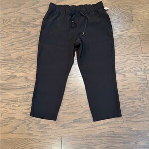 Lululemon On The Fly Crop Pant Travel Black Wrinkle Free Drape Size 10